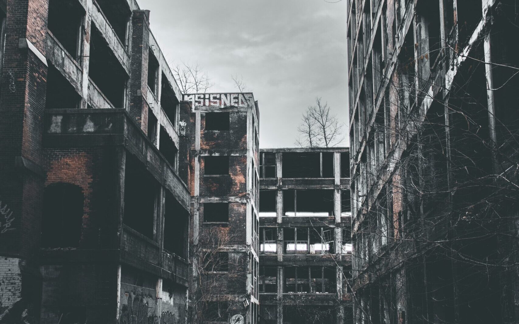 grayscale photo of abandon tenement